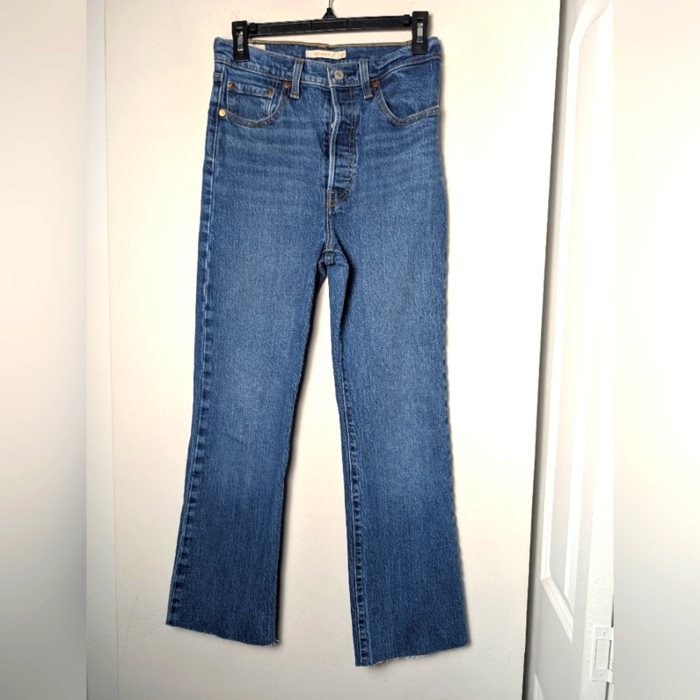 Levi's Ribcage Boot Raw Hem Button Fly Medium
Wash Sz 27